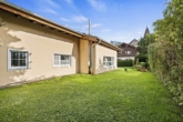 Ansicht West - Großzügige Erdgeschosswohnung mit Garten und Garage, im Herzen von Ruhpolding!