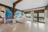 Schlafzimmer mit Balkon - Dachgeschoss-Doppelpack mit Bergblick: Zwei Wohnungen und die Natur zum Greifen nah!